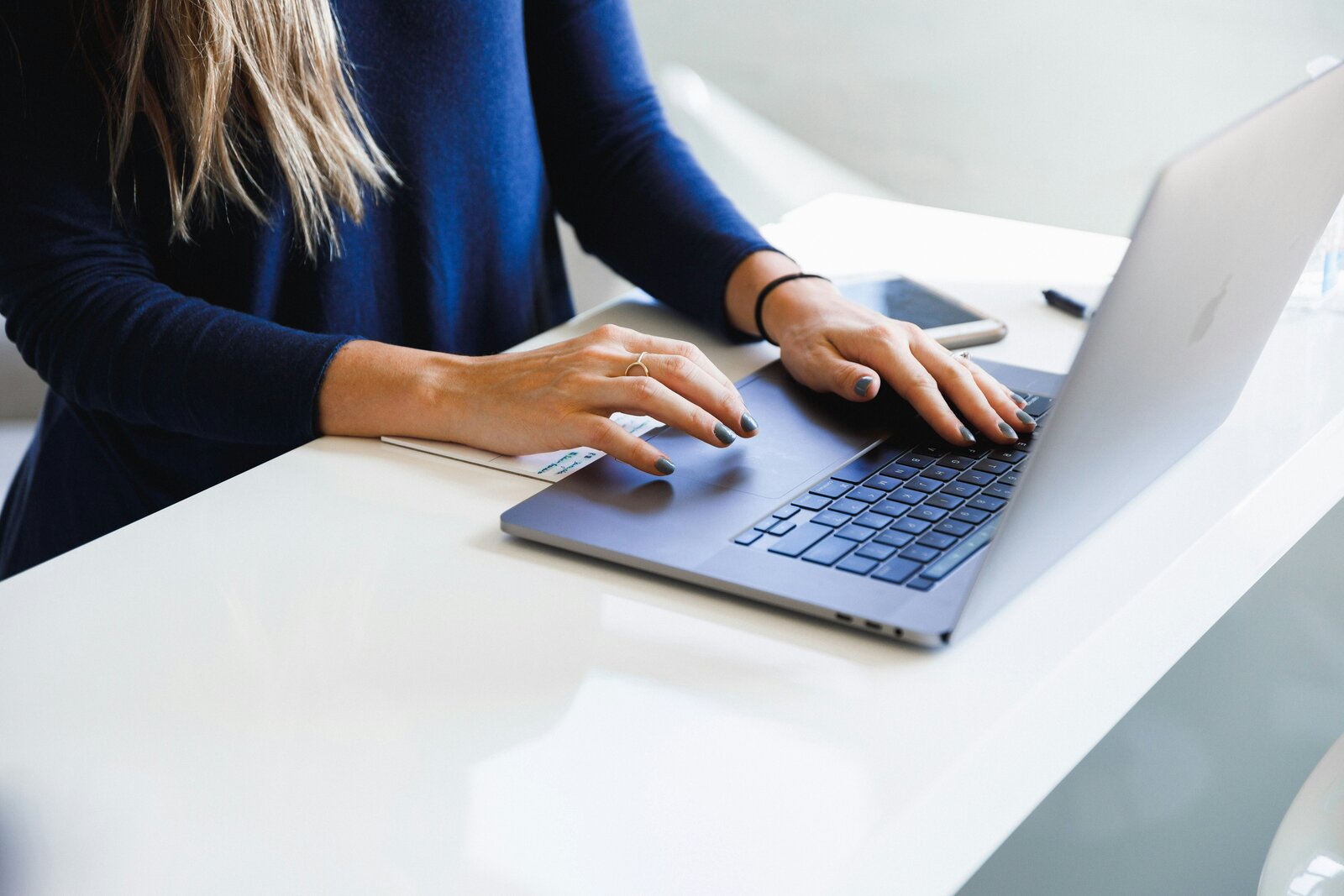 Agency owner at laptop